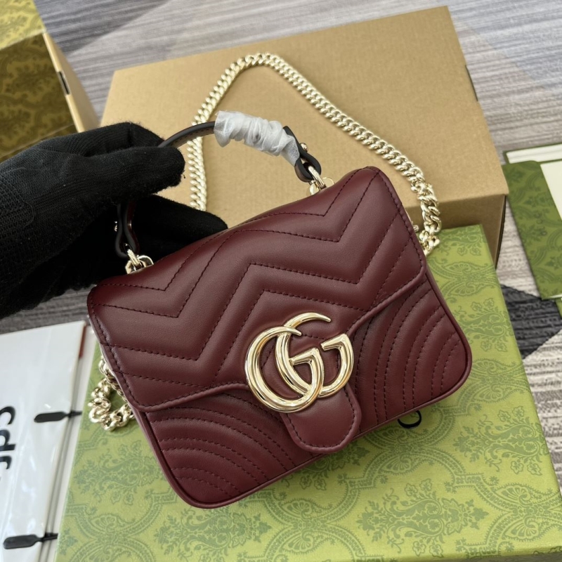 G*u*i top handle bags